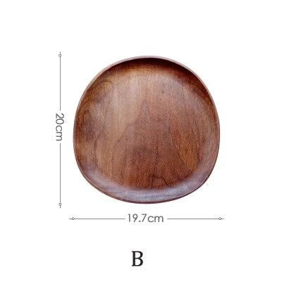 Elegant wooden dining plates with a minimalist, laconic design and natural wood grain