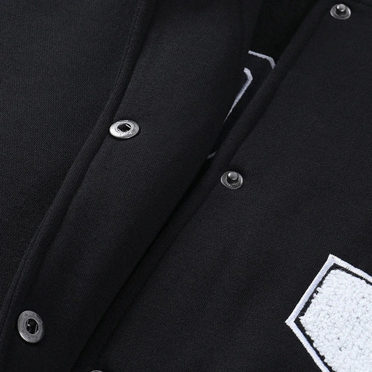 A classic British-style baseball jacket with contrast PU stitching, showcasing a sophisticated and versatile design for casual wear.