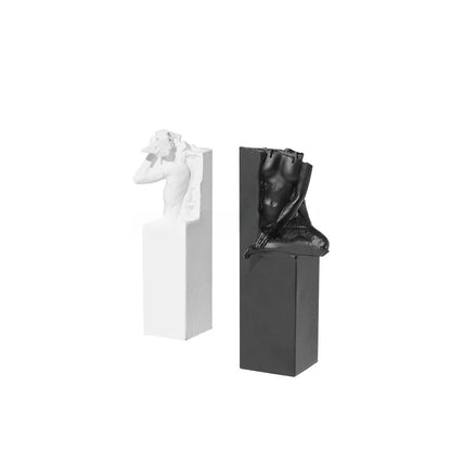 Elegant black and white abstract sculpture for desktop or study decor