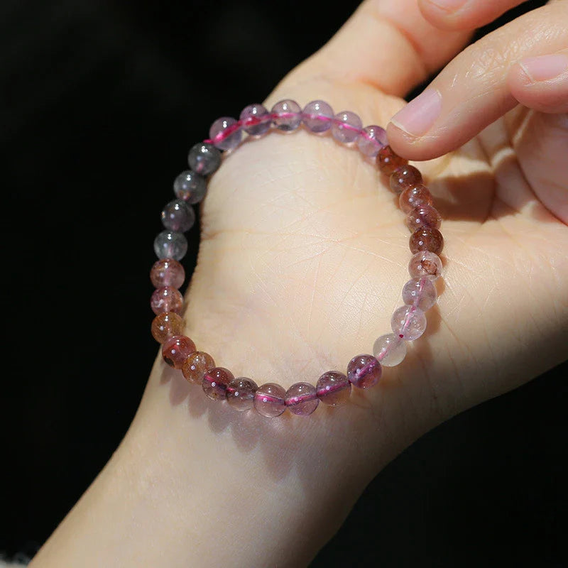 A close-up view of a ladies' fashion bracelet featuring a single loop design with sparkling crystal beads