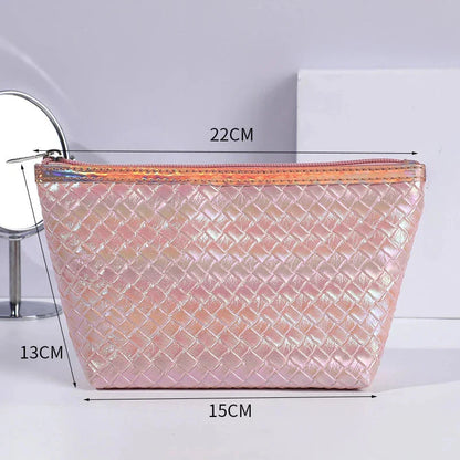 Large leather travel cosmetic bag with stylish paillette pattern, perfect for organising makeup and toiletries on the go