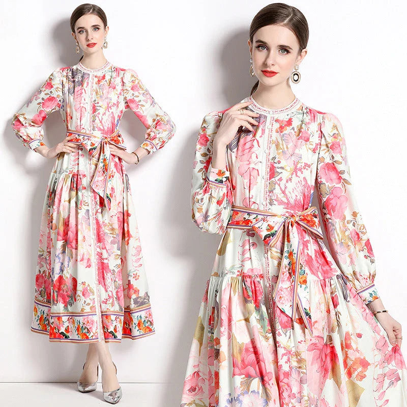 Elegant floral single-breasted swing dress with delicate print, tailored design, and flowing silhouette