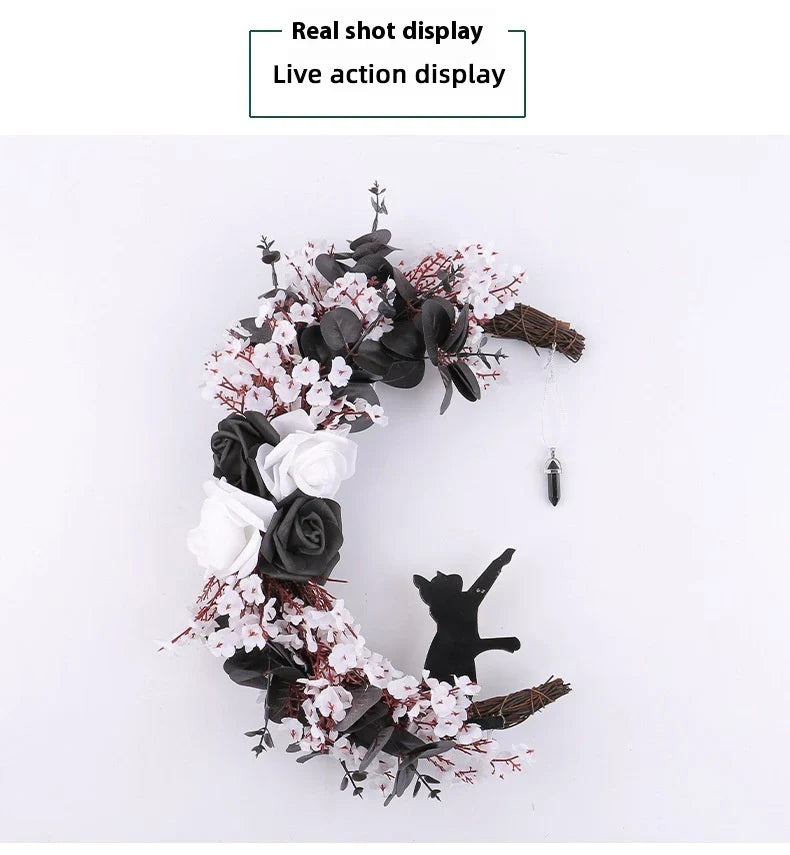 Spooktacular Halloween garland featuring a blend of dried white flowers, black roses, and mystical moon cat ornaments