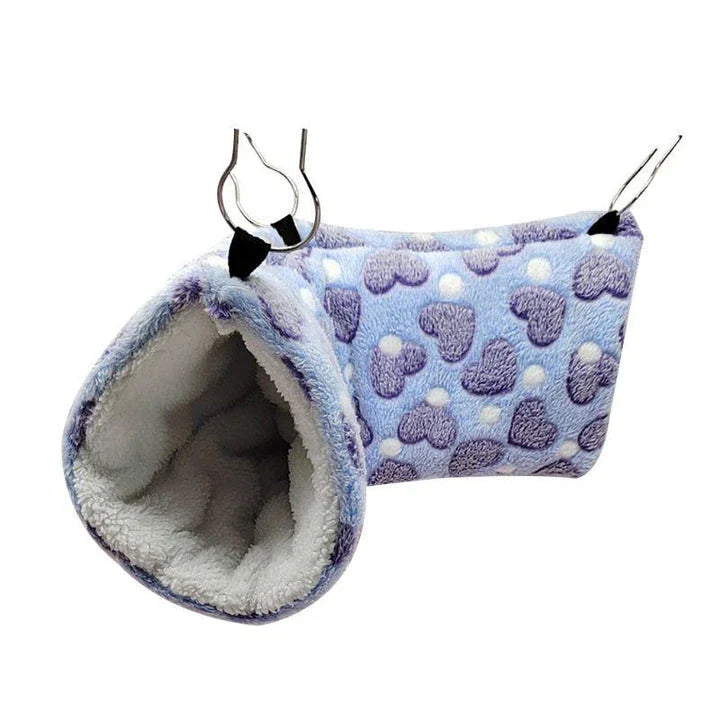 Cosy plush tunnel in grey for small pets like hamsters and guinea pigs, providing a comfortable and secure hideaway