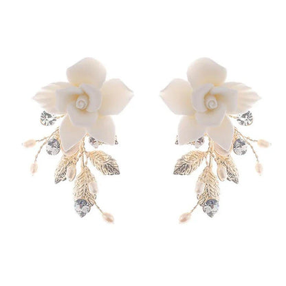 Elegant bridal hair accessories set with flower-shaped comb and gold-tone earrings