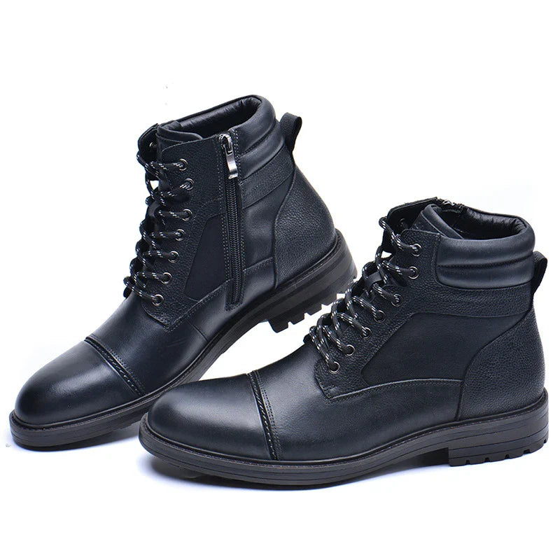 A pair of durable, stylish cowhide leather men's boots in a classic British design