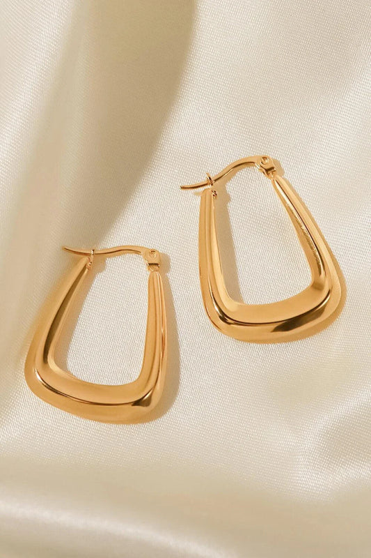 A pair of 18K gold-plated geometric earrings with a sleek and modern design