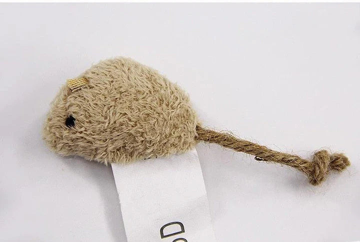 Three plush mice in various colours, designed as engaging toys for playful cats in the UK.