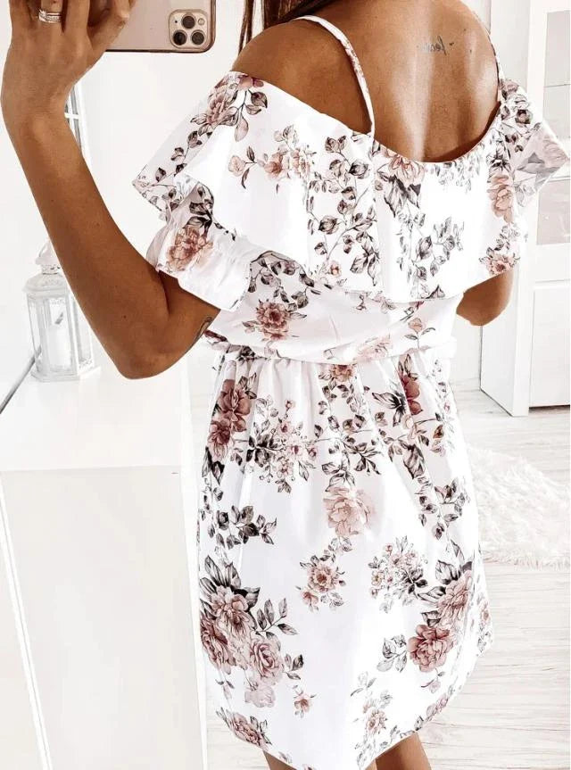 A stylish floral print dress with a flattering waist design, perfect for professional commuting