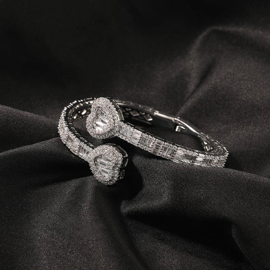 Elegant geometric bracelet with diamond accents in gold, silver, and rose gold finishes