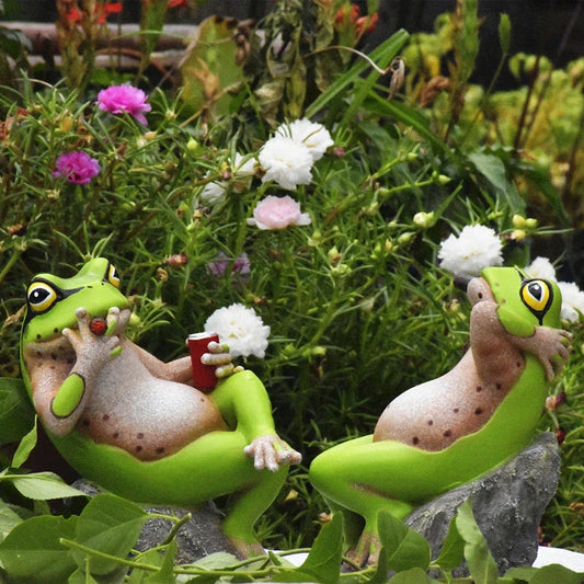 Charming frog garden figurines in various mischievous poses, adding a playful touch to outdoor decor