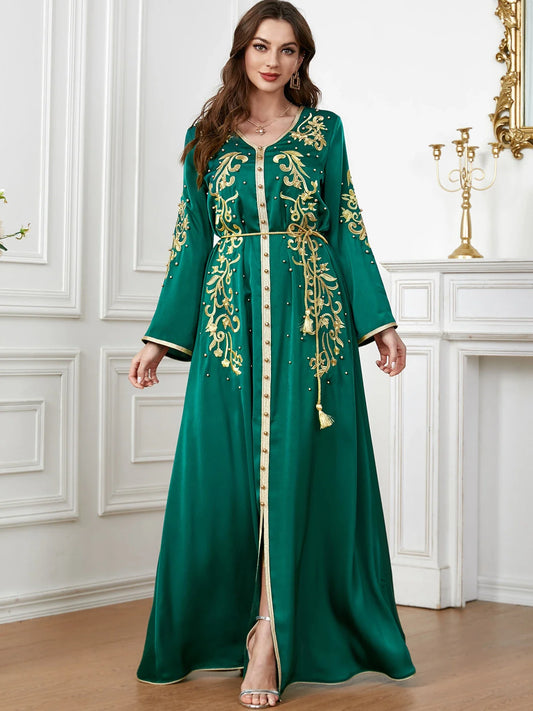 A sophisticated long-sleeve women's dress with a captivating floral embroidery pattern and a refined colour palette, suitable for a variety of occasions.