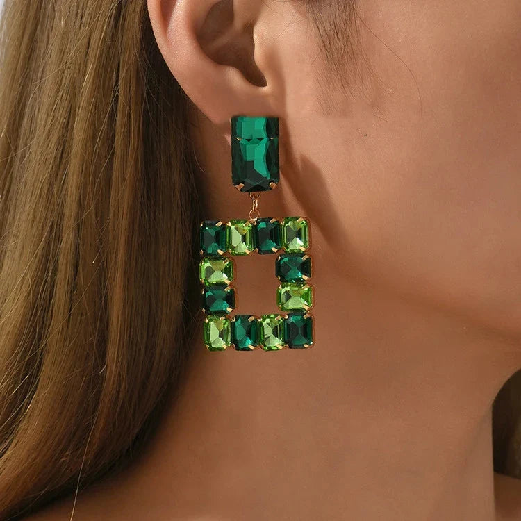 Pair of enchanting crystal earrings made with premium artificial crystals in various colours including rose red, green, pink, champagne, and black
