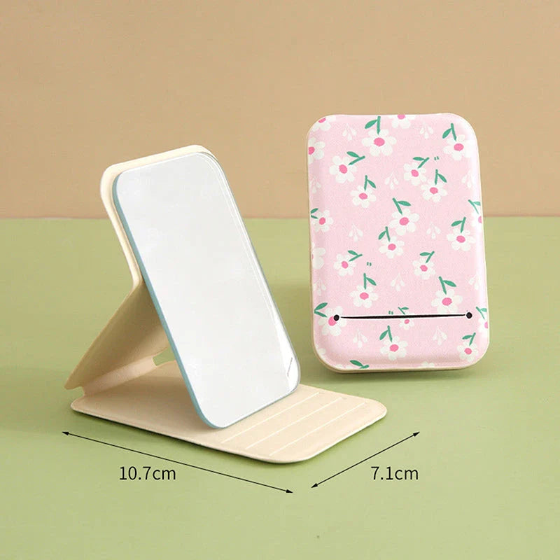 Elegant floral folding makeup mirror with a unique design and clear, distortion-free reflection