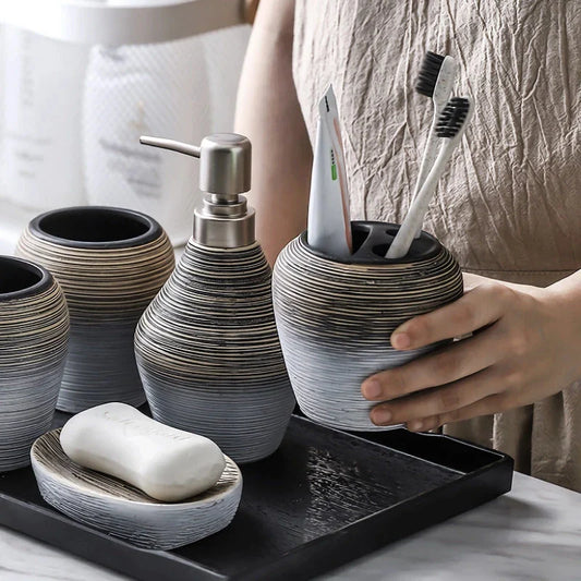 Elegant retro ceramic bathroom accessories set with toothbrush holder, soap dispenser, and mouthwash cup