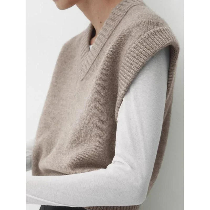 Chic Autumn/Winter Women's Soft Knitted V-Neck Vest in a classic solid colour, featuring a cosy turtleneck collar and sleeveless design for easy layering.