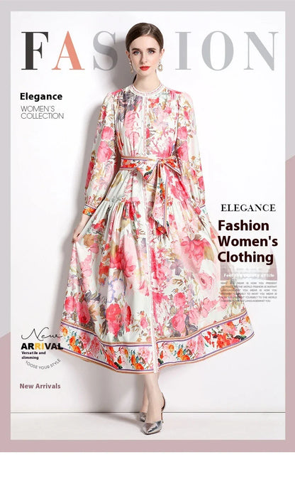 Elegant floral single-breasted swing dress with delicate print, tailored design, and flowing silhouette
