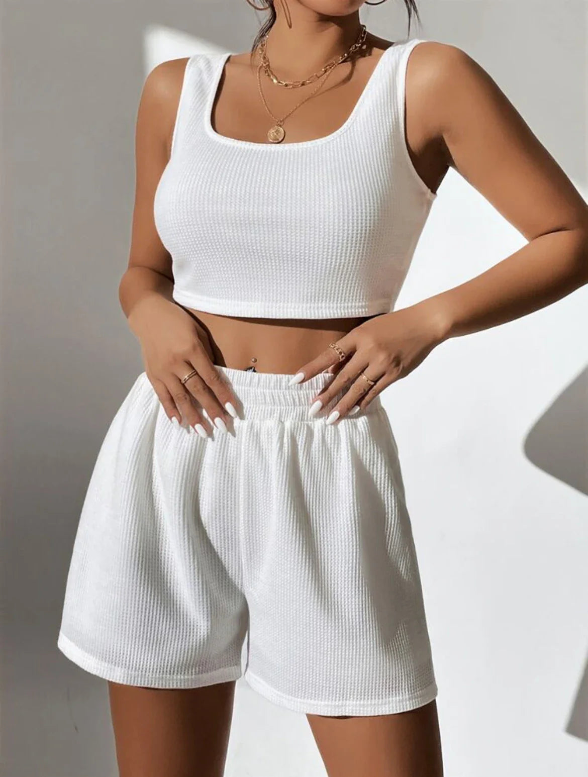 A cosy, cotton knit sleeveless homewear set for women, available in a variety of timeless colours.