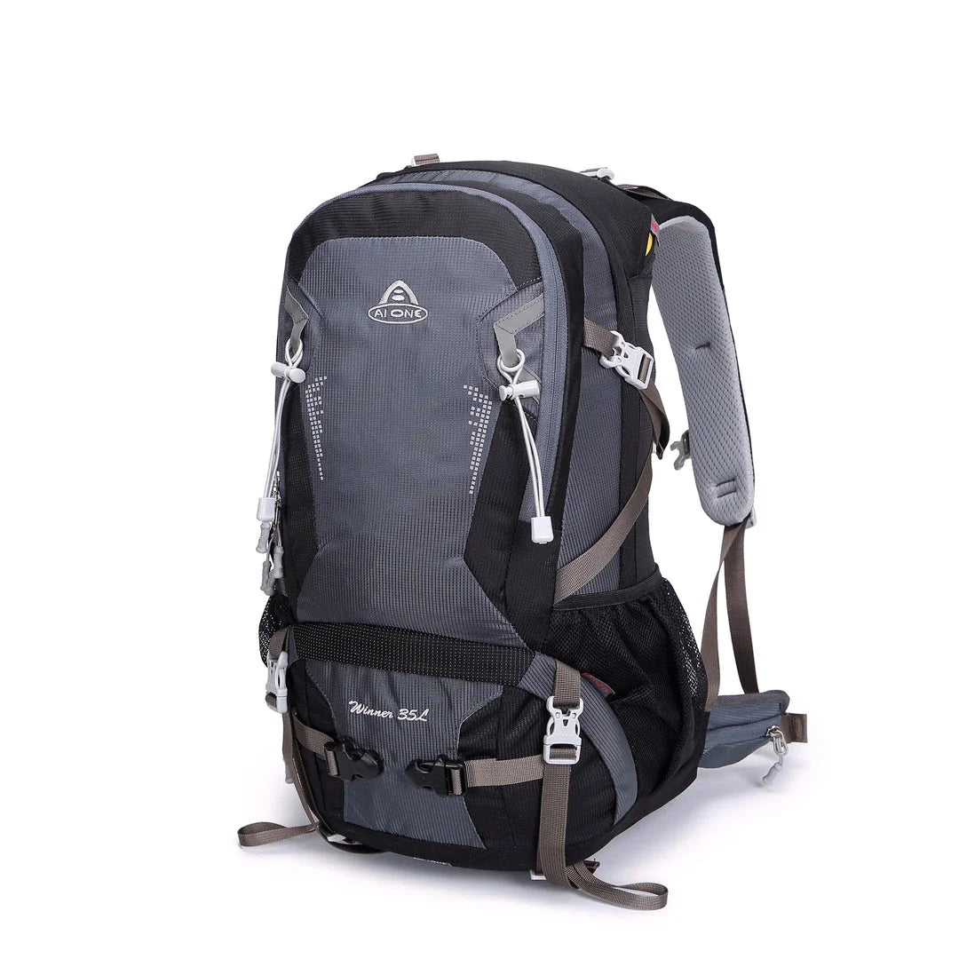 Durable outdoor climbing backpack with integrated raincover, featuring waterproof nylon construction, adjustable straps, and multiple storage compartments.