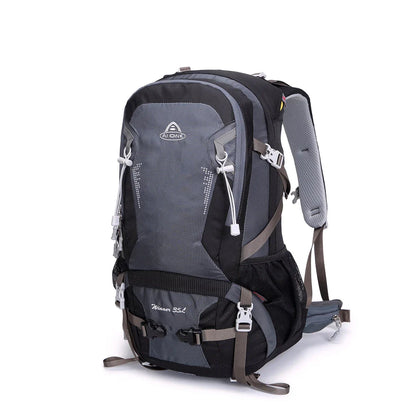 Durable outdoor climbing backpack with integrated raincover, featuring waterproof nylon construction, adjustable straps, and multiple storage compartments.
