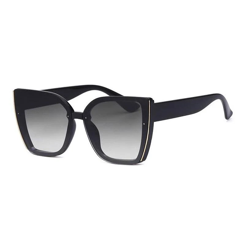Chic oversized cat eye sunglasses with a vintage-inspired design and UV400 protection for stylish British women