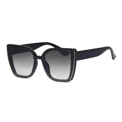 Chic oversized cat eye sunglasses with a vintage-inspired design and UV400 protection for stylish British women