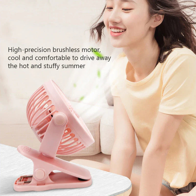 Portable Mini Hand Clip Fan with adjustable wind speed, 360° rotation, and USB rechargeable design for instant cooling relief