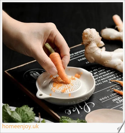 Ceramic ginger grater with no sharp blades, ideal for a family-friendly kitchen