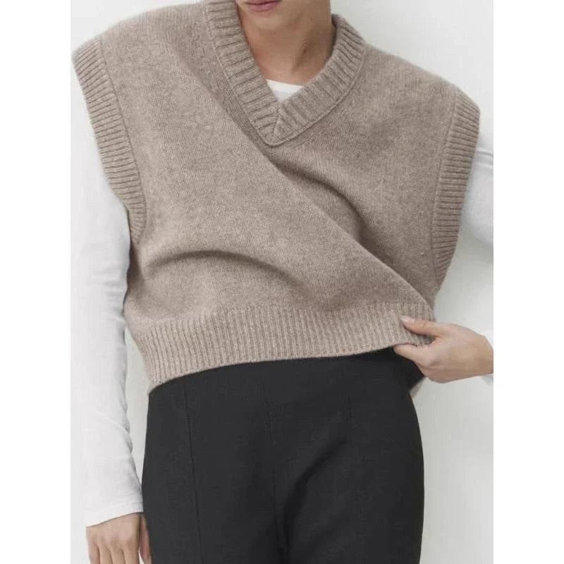 Chic Autumn/Winter Women's Soft Knitted V-Neck Vest in a classic solid colour, featuring a cosy turtleneck collar and sleeveless design for easy layering.