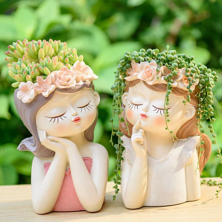 A charming 7.8-inch resin planter in the shape of a fairy girl, perfect for displaying succulents and adding whimsical decor to your home or office.