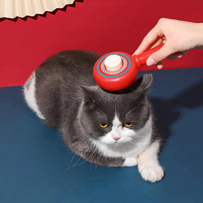 One-Click Pet Hair Removal Comb in red colour, designed to effectively remove loose fur and tangles from cat or dog coats