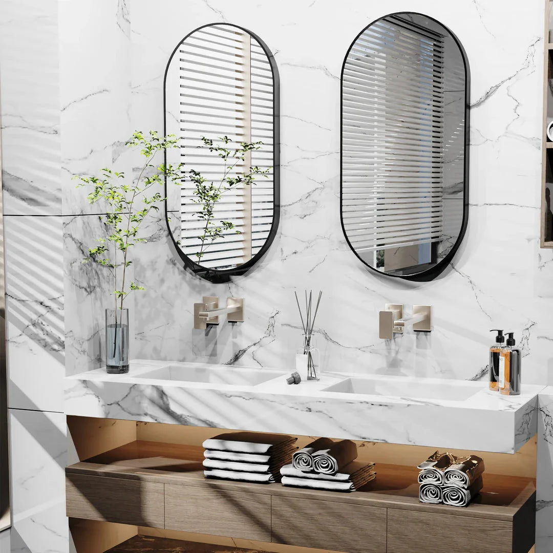 Elegant black oval-shaped wall mirror with a modern and sophisticated design, perfect for bathroom, entryway, and living room decor.