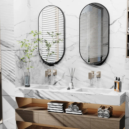 Elegant black oval-shaped wall mirror with a modern and sophisticated design, perfect for bathroom, entryway, and living room decor.