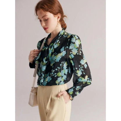 Elegant floral silk blend blouse for women featuring a bow collar, puff sleeves, and a flattering straight-cut silhouette