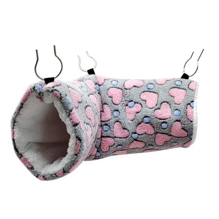 Cosy plush tunnel in grey for small pets like hamsters and guinea pigs, providing a comfortable and secure hideaway