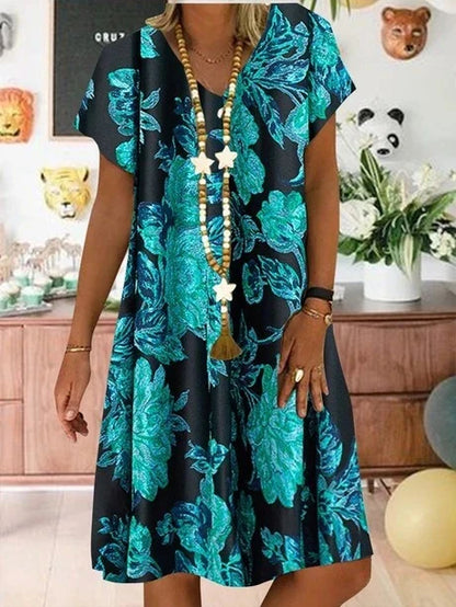 Elegant A-line dress with V-neckline and vibrant print, perfect for formal occasions and everyday wear