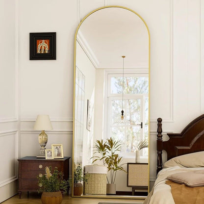 Elegant arched full-length gold mirror with premium aluminium frame, providing a high-definition reflection for your daily routine