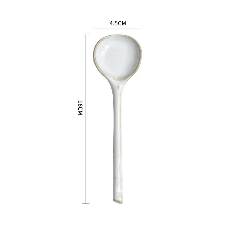 Elegant British ceramic soup spoon with long handle and vibrant glaze for refined dining experience