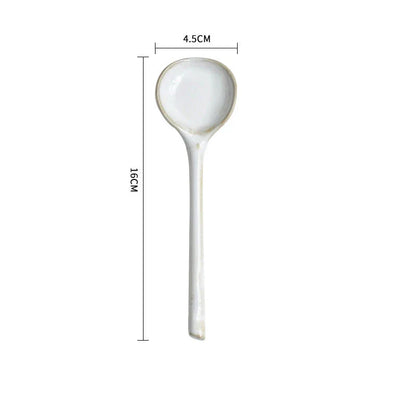 Elegant British ceramic soup spoon with long handle and vibrant glaze for refined dining experience