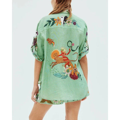 Elegant floral print 2-piece summer vacation outfit with short-sleeved top and matching shorts