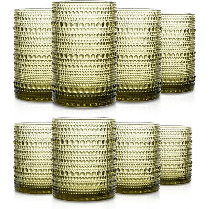 Set of 4 elegant retro-inspired drinking glasses with unique bead design and comfortable grip