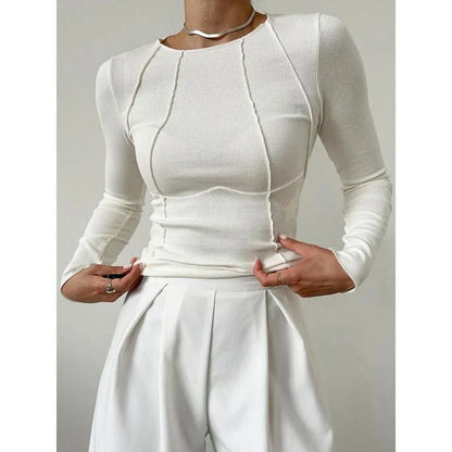 A model wearing a comfortable and stylish long sleeve t-shirt in a solid white colour.