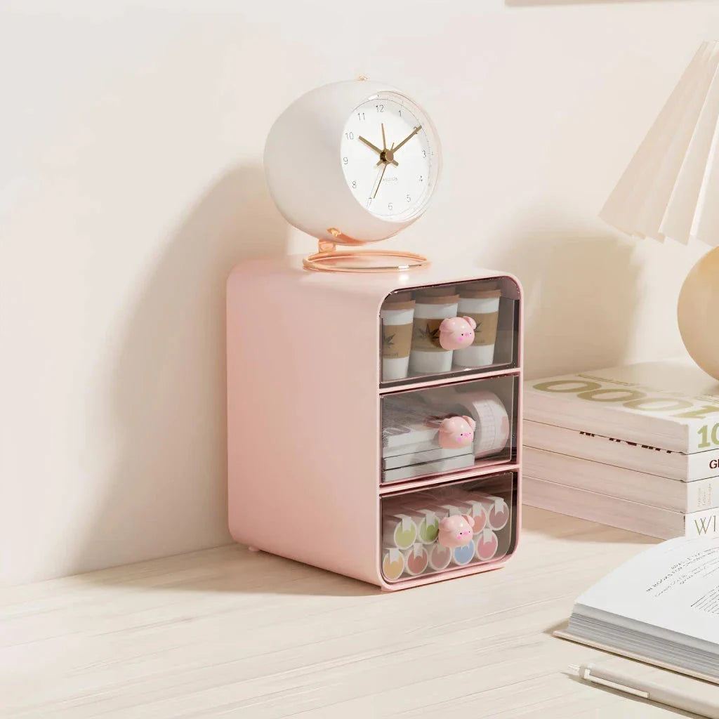 Clear acrylic desk organiser with three pull-out drawers, designed to declutter and organise your workspace