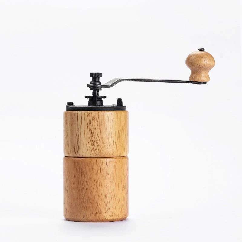 Elegant wooden manual coffee grinder with steel conical burr for consistent, flawless grinding
