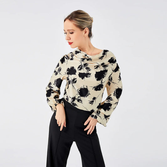 Elegant ladies' blouse with a printed pattern, dropped collar, and long sleeves in a classic white colour