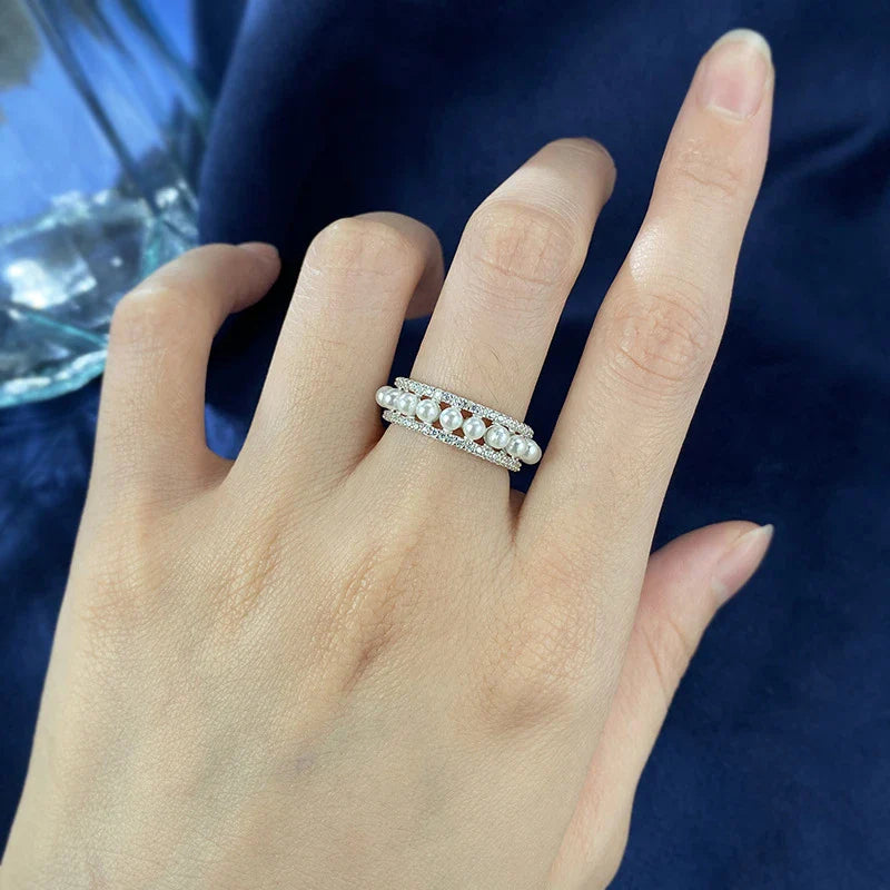 A beautiful 925 sterling silver ring with a delicate pearl accent, designed for the discerning British woman