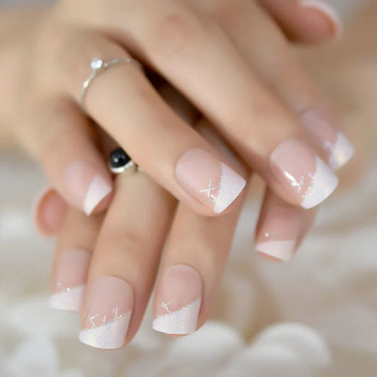 Iridescent white glitter short square French nail tips for a dazzling manicure