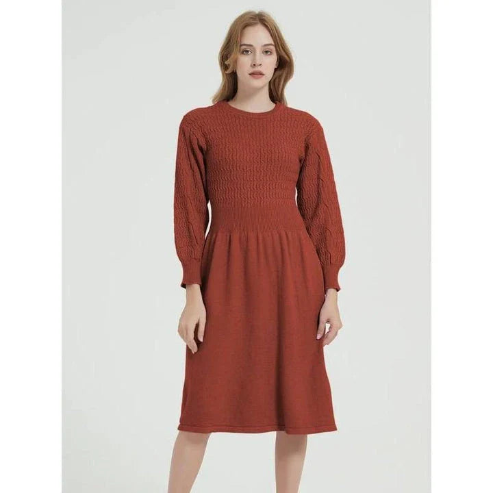 Elegant long sleeve knitted sweater dress in red with a classic A-line silhouette and mid-calf length