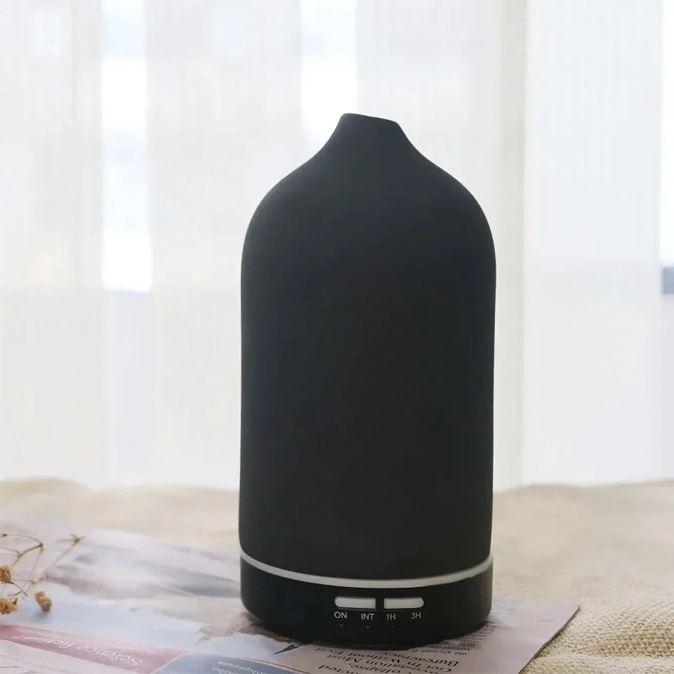 Elegant ceramic ultrasonic essential oil diffuser with timer and night light function for home ambiance and aromatherapy