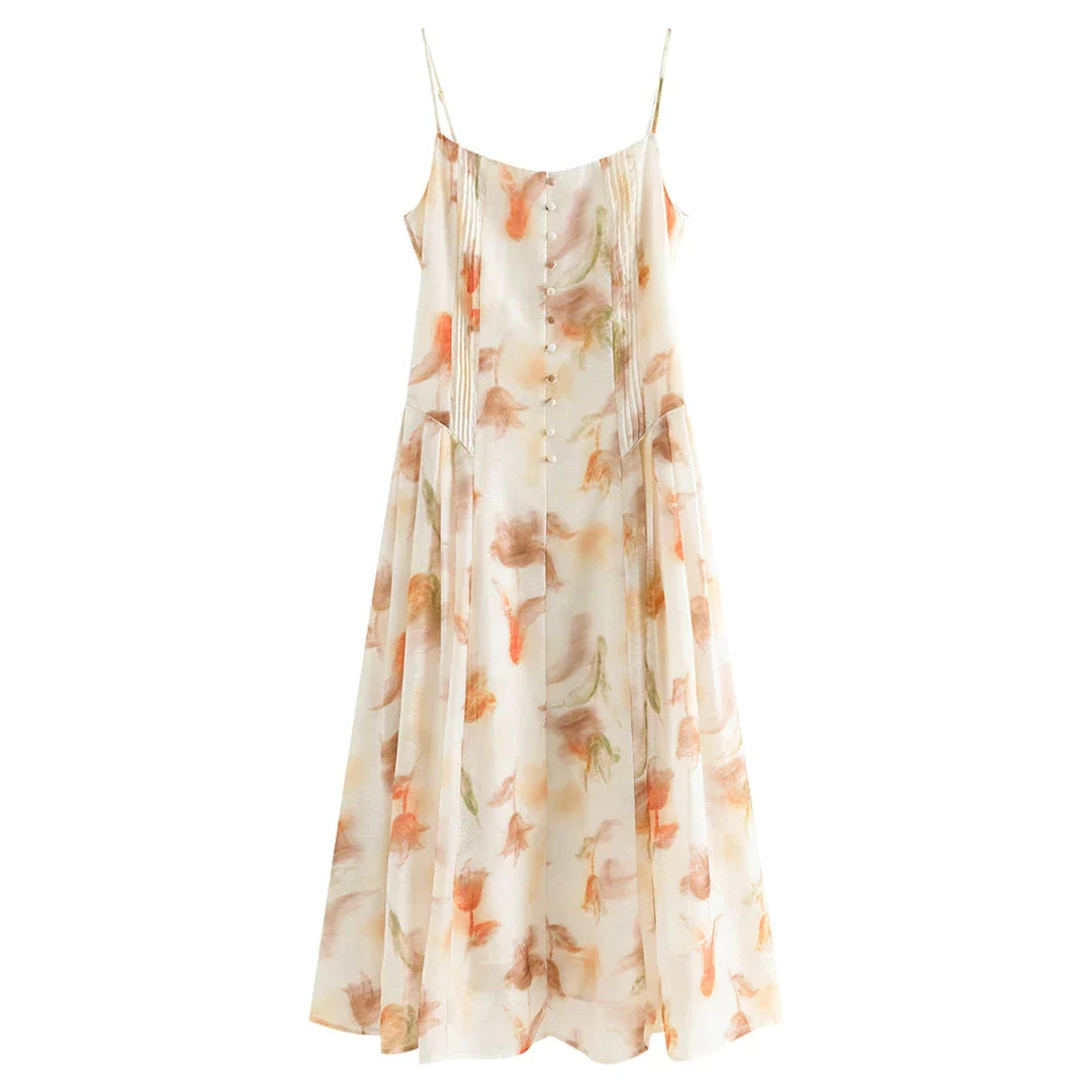 Elegant floral sleeveless summer dress in orange with a flattering A-line silhouette, perfect for British summer occasions.